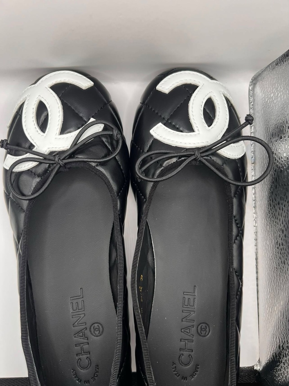 CHANEL Black Leather Quilted Ballet Flats with White CC Appliqué